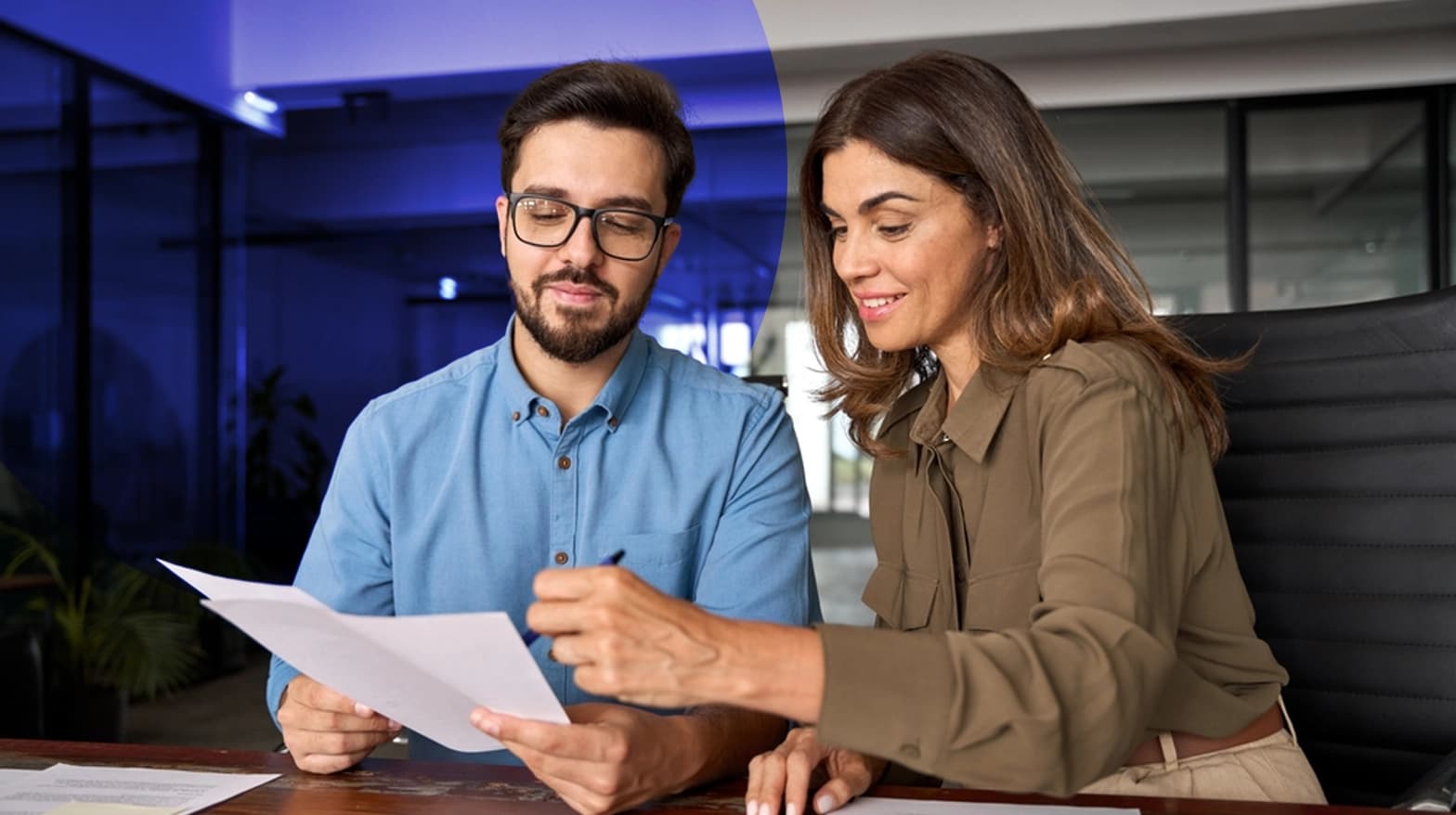 Agent discussing life insurance with client Agent discussing life insurance with client